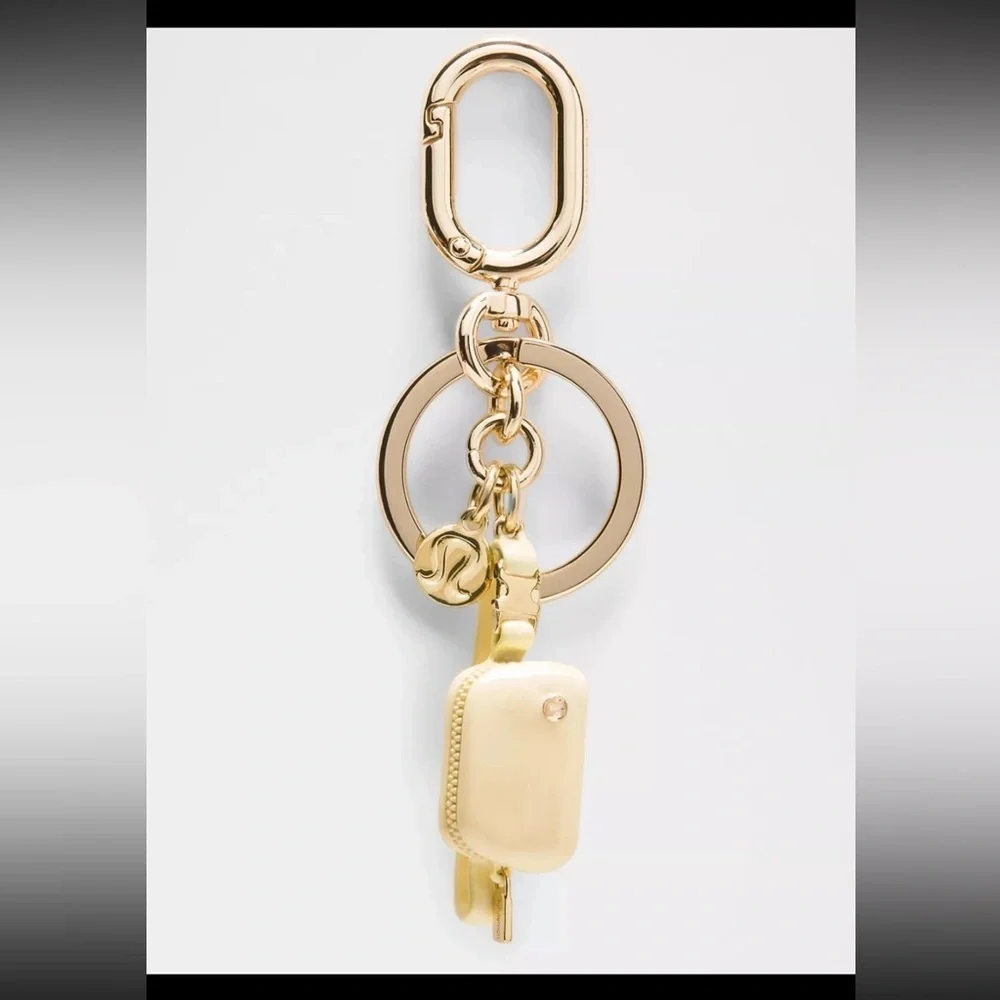 Lululemon Athletica Gold and Cream Key Holder